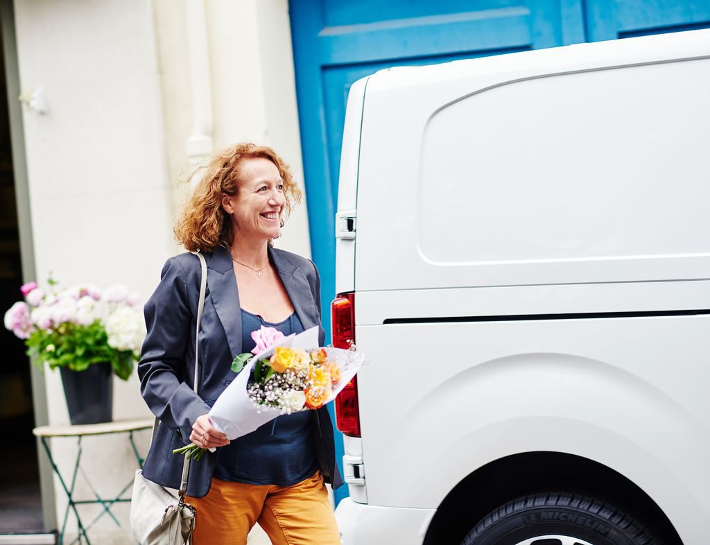 woman delivering flowers at easter